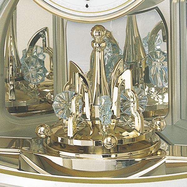 画像: 煌めく回転飾りがインテリアに華を添えるアナログ電波置時計